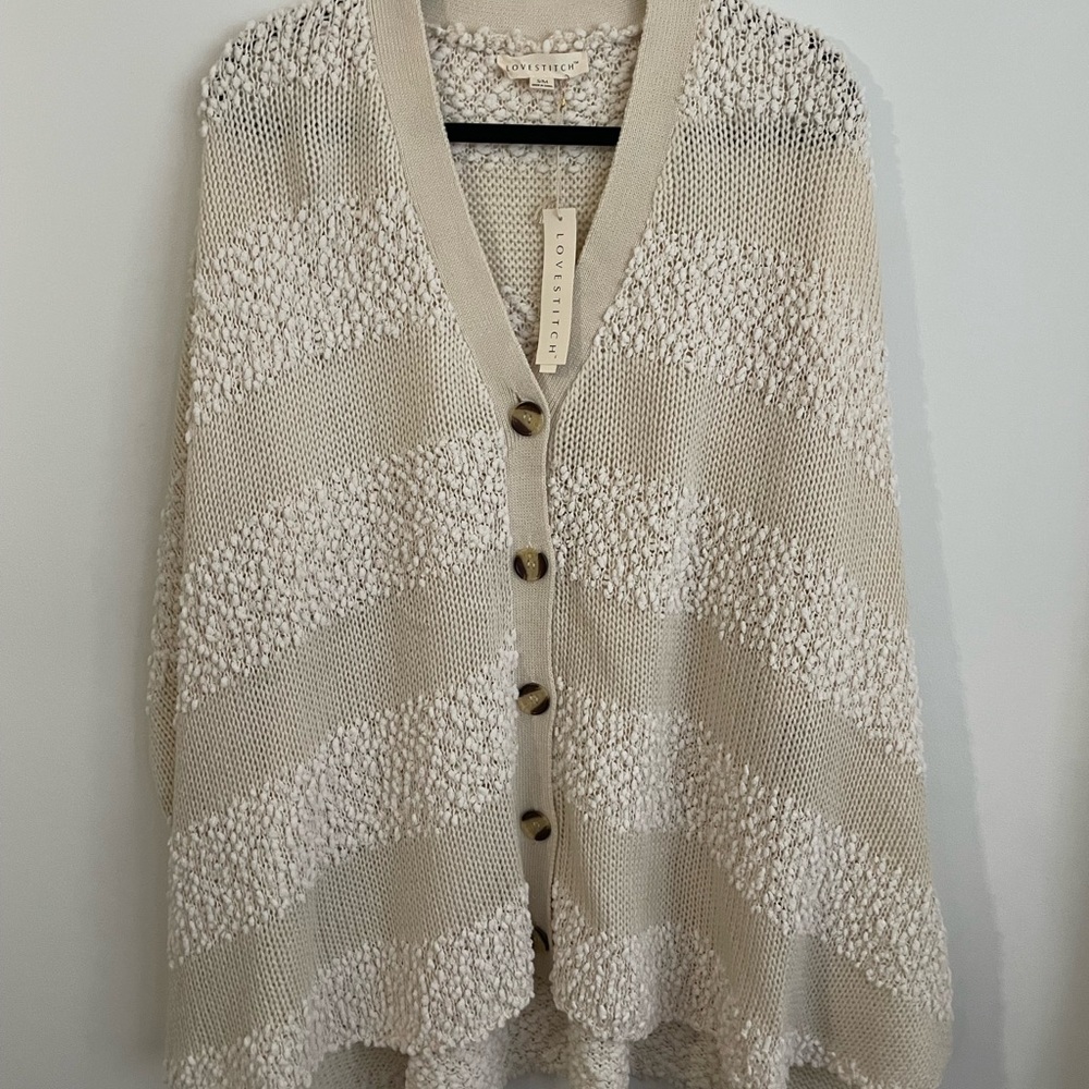 Cream knitted poncho